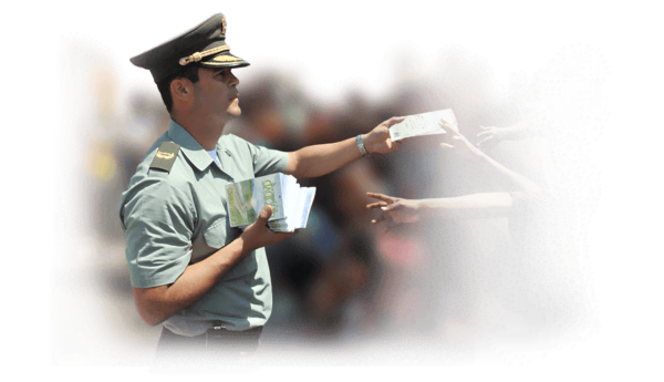 giving out The Way to Happiness booklets